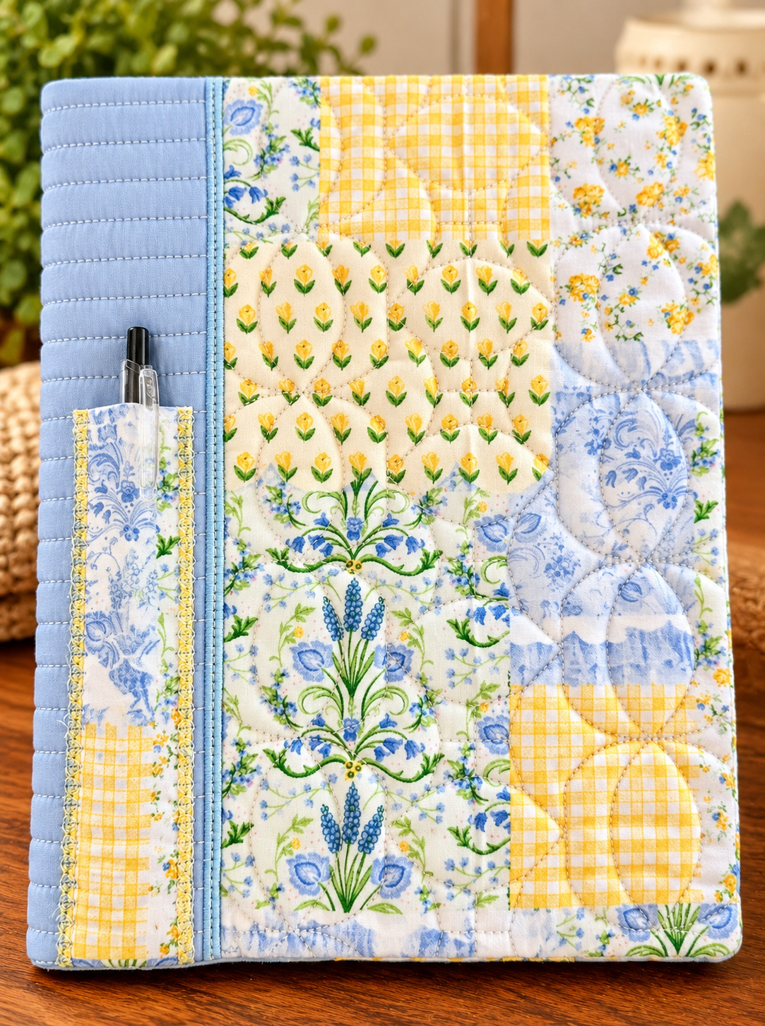 Blue and yellow patch notebook cover