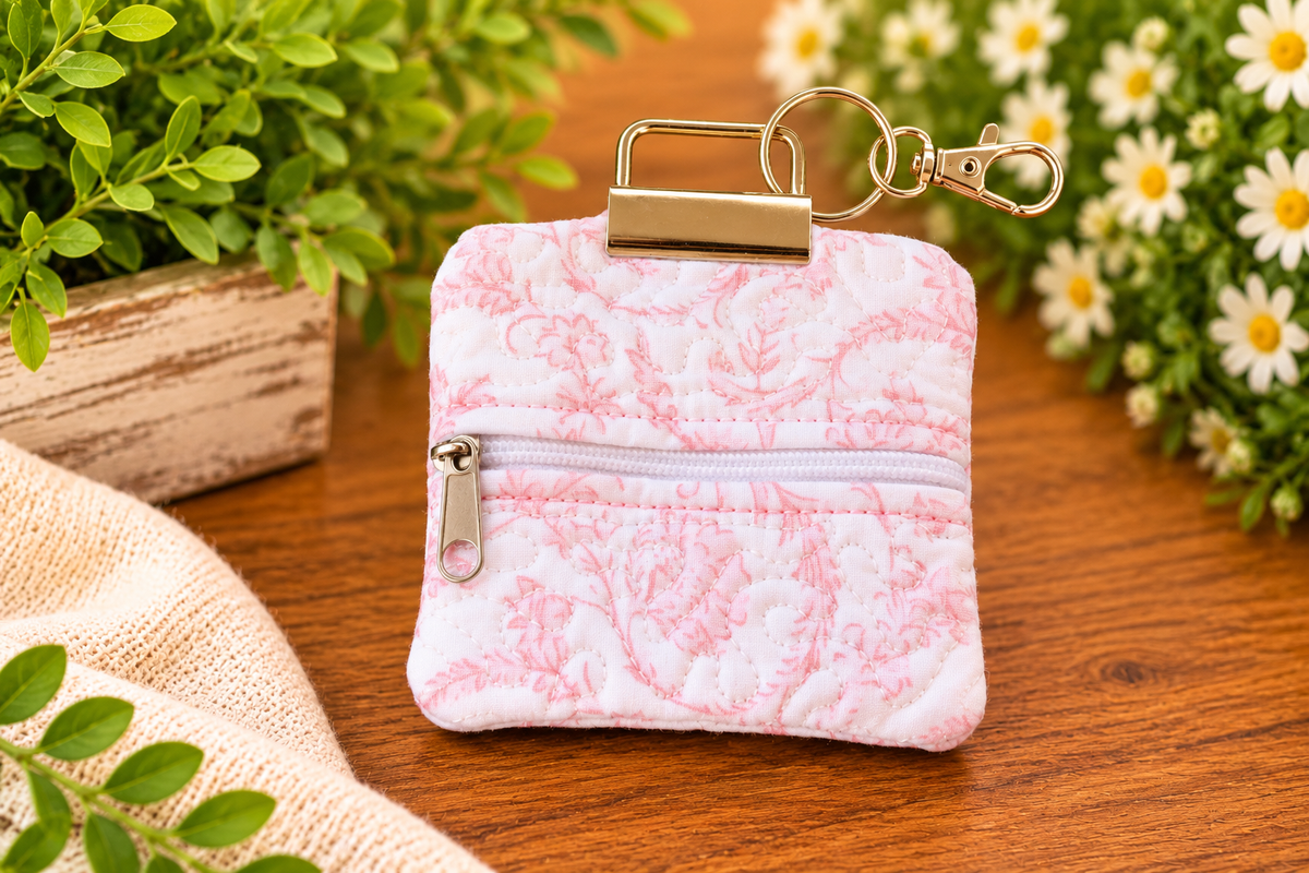 Pink scroll earbud case